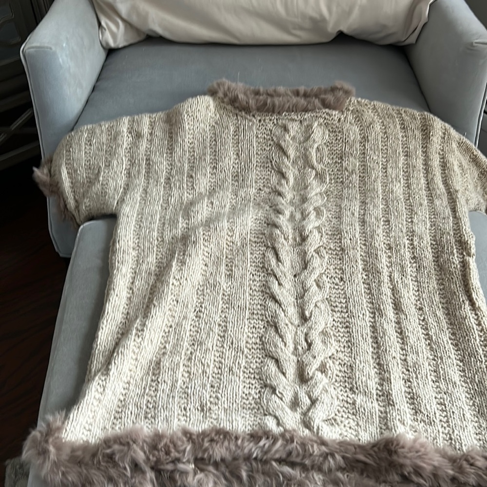 Hand made cashmere and fur.  Worn once.  Probably yarn and time is worn more